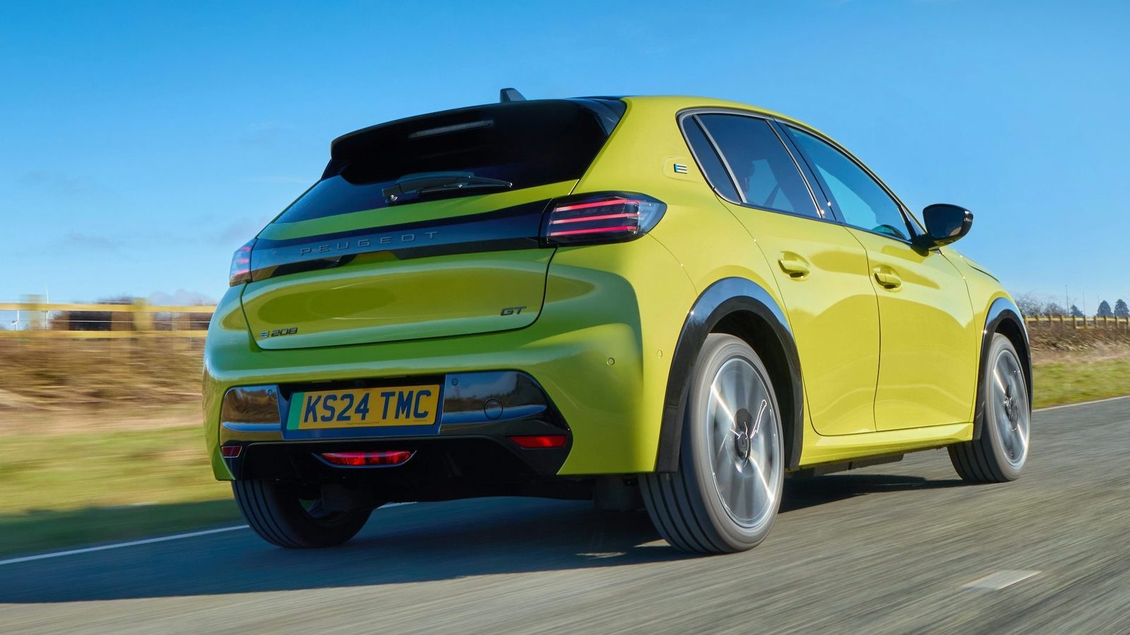 Peugeot E-208 2019 — экстерьер, rear 3q blue, рынок UK editorial reference