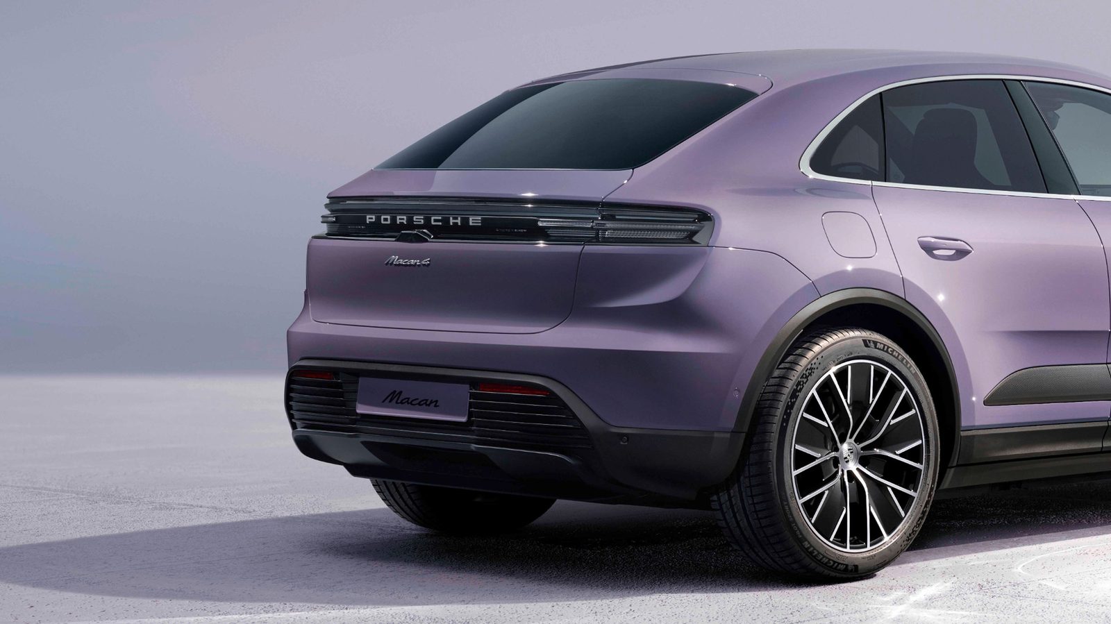 Porsche Macan Electric 2024 — экстерьер, вид сзади 3/4, рынок US
